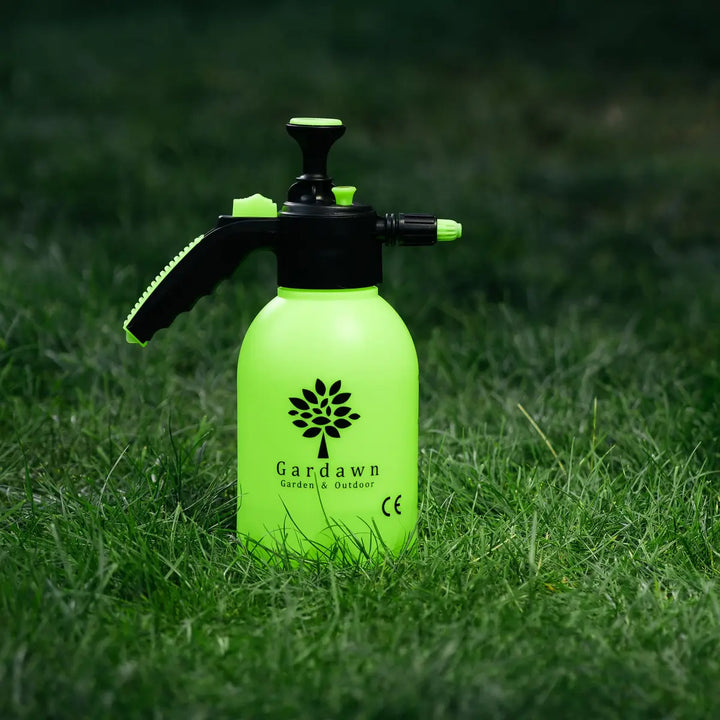 2L garden sprayer placed on outdoor grassy surface